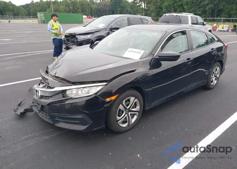2018 Honda Civic Lx z USA, uszkodzony, nr VIN 19XFC2F57JE201001